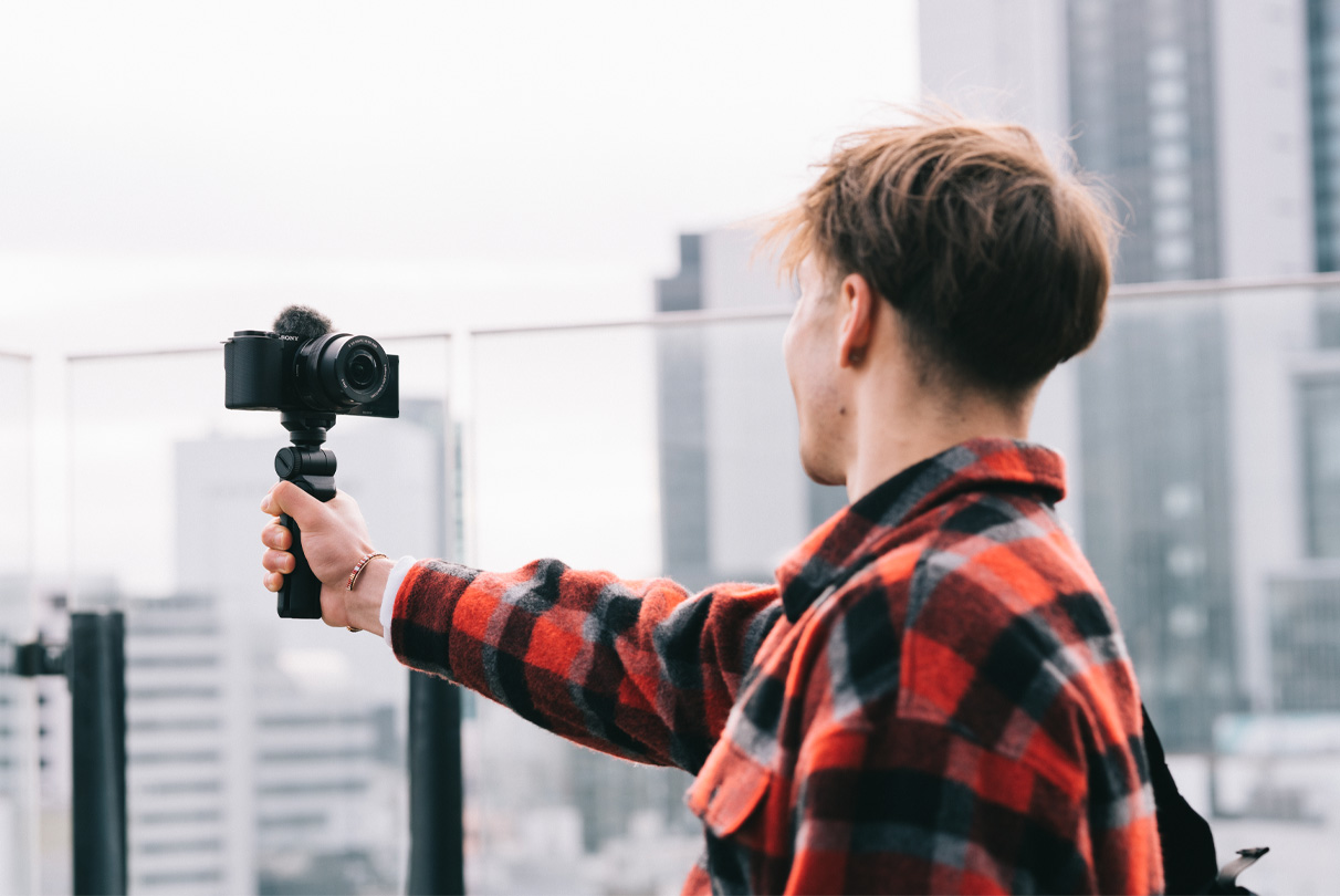 Situational image of a person recording in windy places