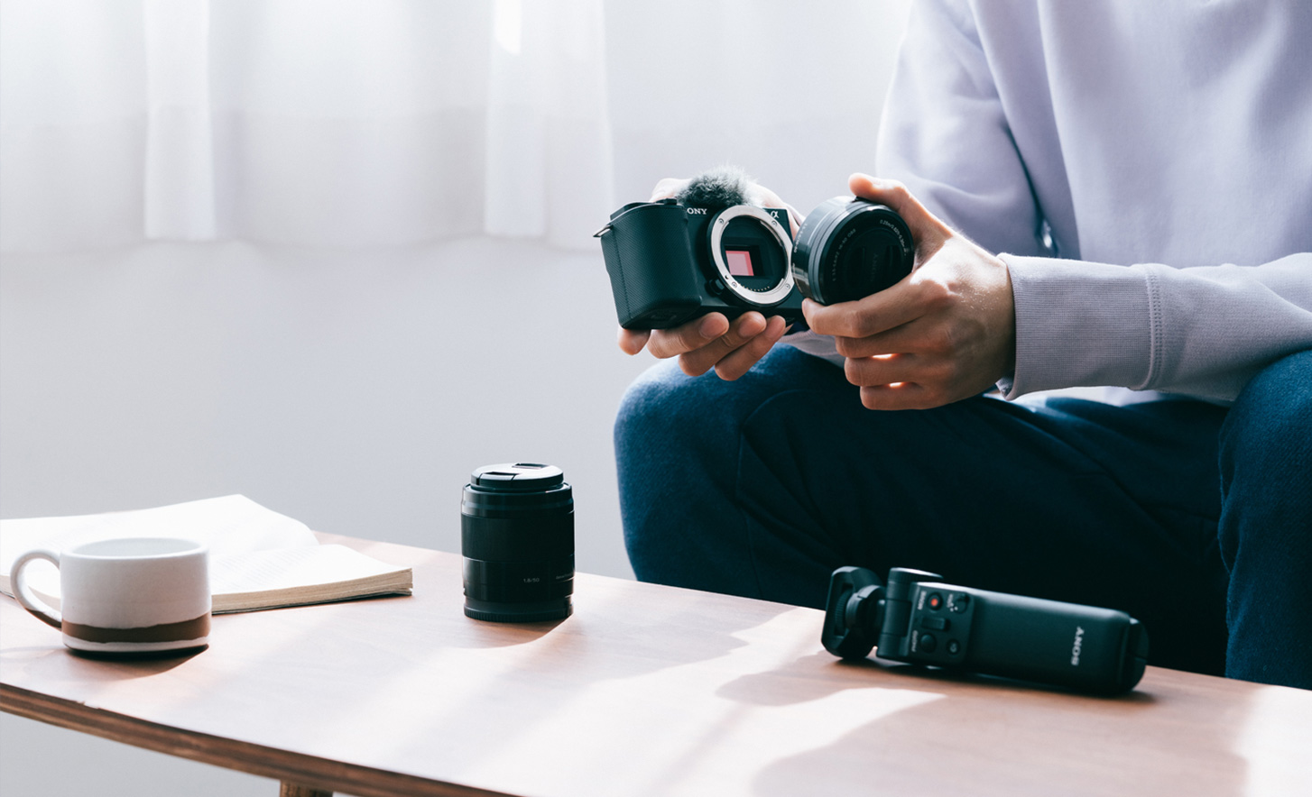 Picture of a person changing the lens