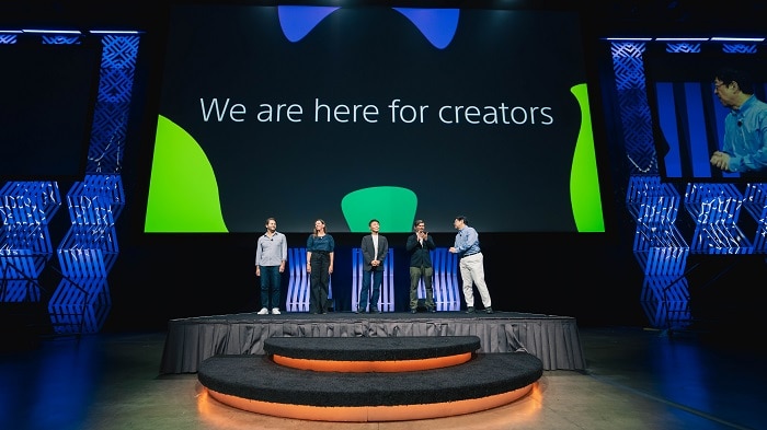 Image of all speakers on stage