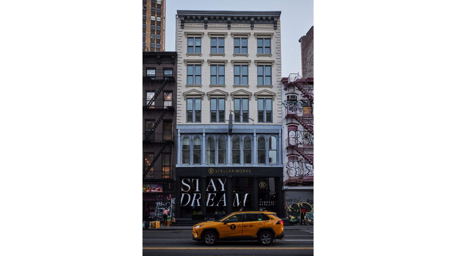 Exterior shot of the Stellar Works showroom in New York with STAYDREAM decal on the windows