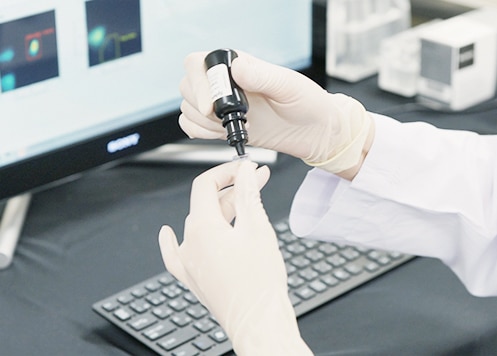 Image of a researcher at work in a lab