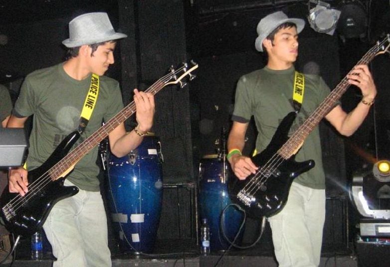 Photo of Marco MartÍnez playing bass in his band