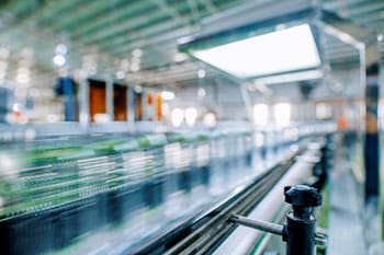 Image of a subject on a manufacturing line moving at high speed.